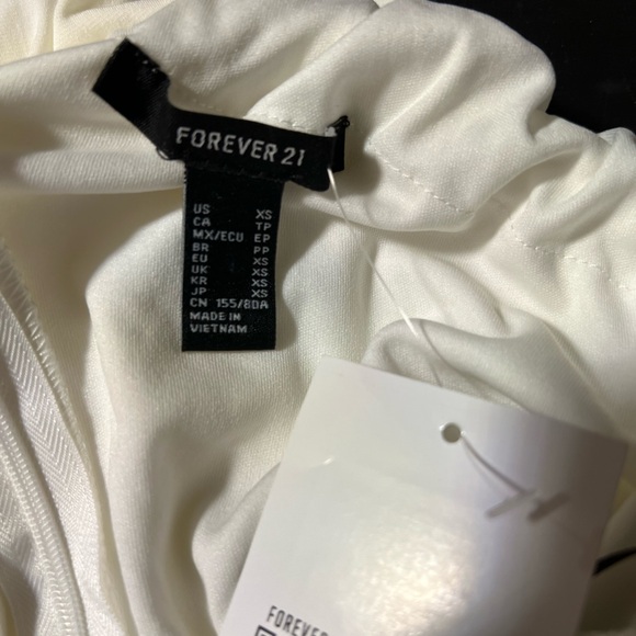 NWT-Cutout One-Shoulder white Midi Dress
SZ XS - Picture 3 of 7